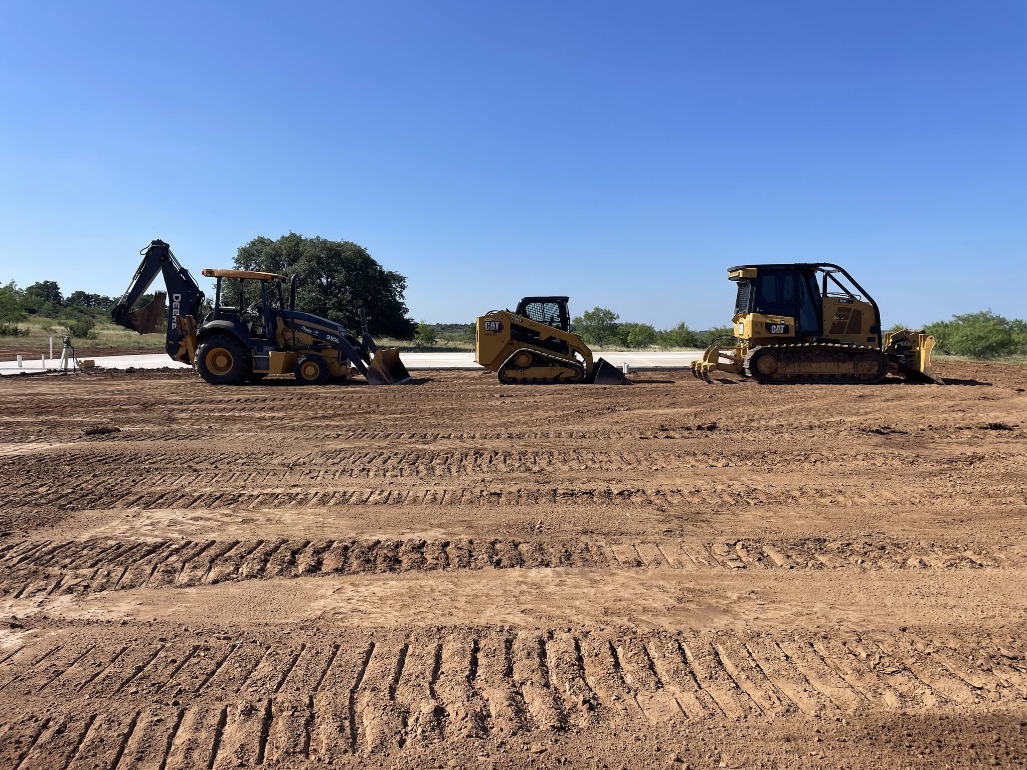 West Texas Plumbing Solutions heavy equipment on a job site in Breckenridge