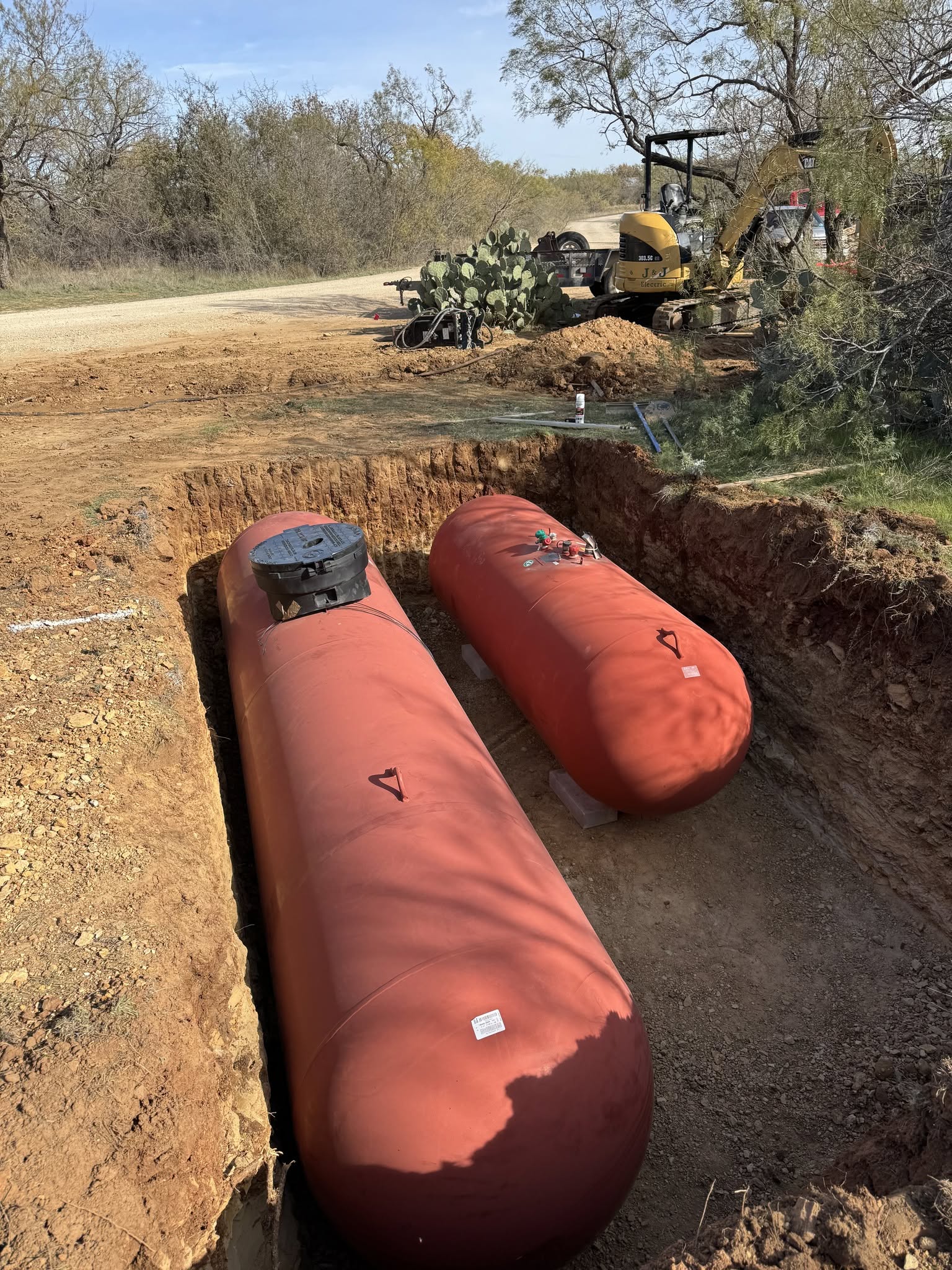 Underground storage tanks set in a professionally excavated trench