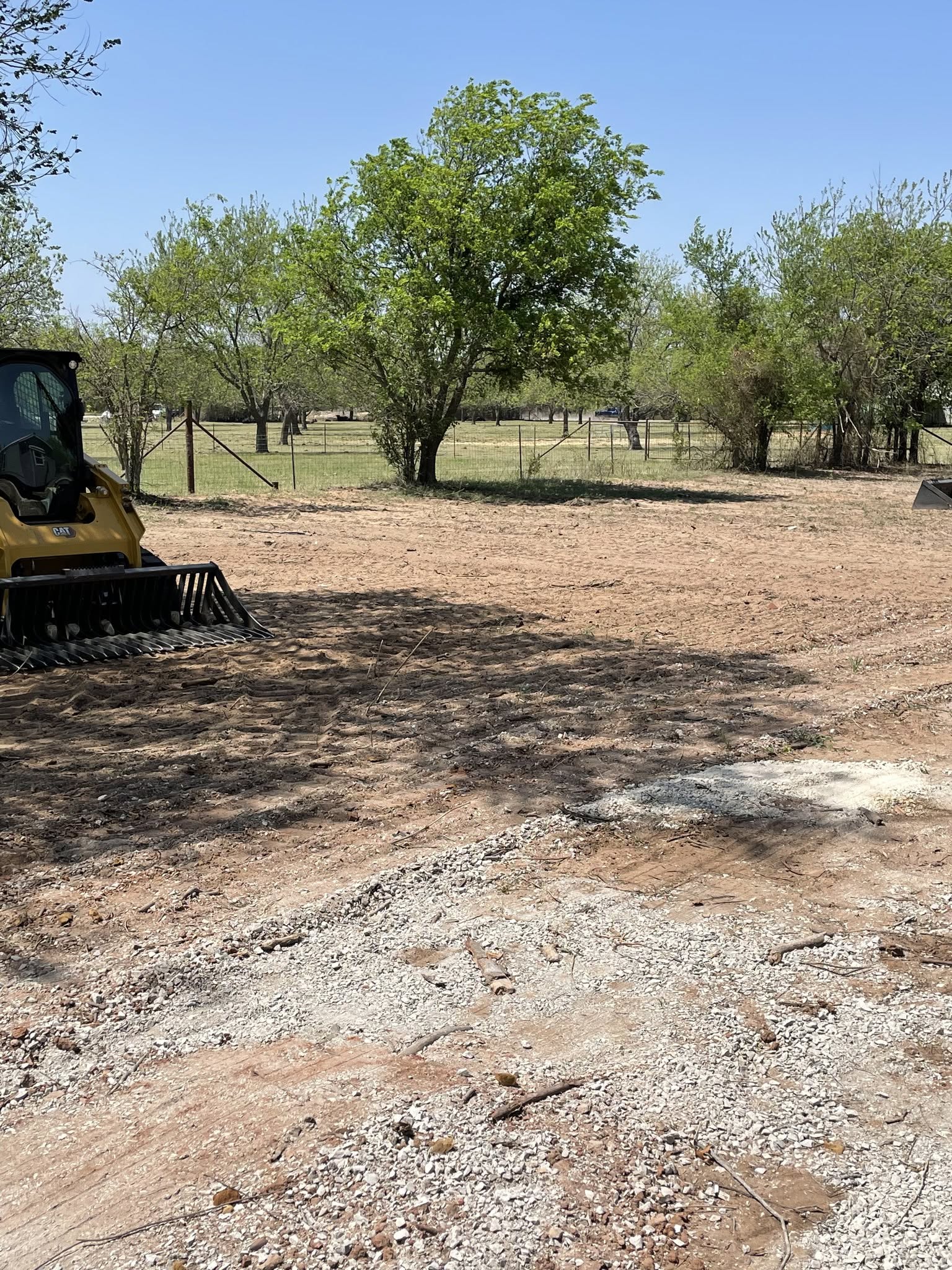Skid steer and site prep for plumbing infrastructure project